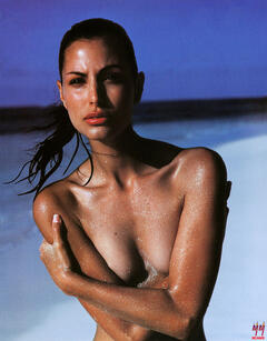 Elsa Benitez topless cover her breasts