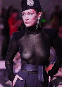 Bella Hadid in see through top runway image