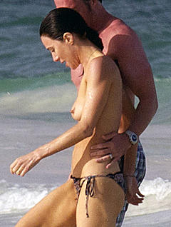 Jaime Murray topless at the beach paparazzi pics