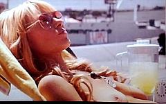 Laura Prepon sunbathing topless