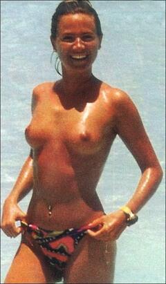 Federica Panicucci topless on a beach paparazzi photo