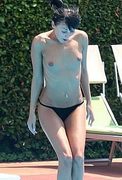 Diana Kleimenova topless jumping in a pool