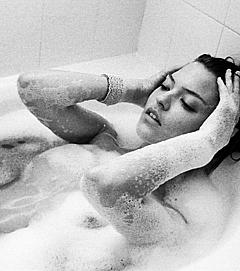Martha Hunt nude in a bathtub