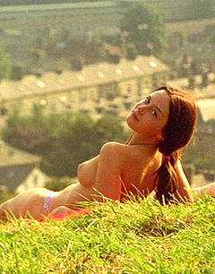 Emily Blunt tanning topless in My Summer of Love