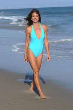 Brooke Burke in blue swimsuit