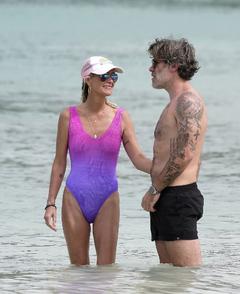 Laeticia Hallyday in a swimsuit on the beach in St Barths