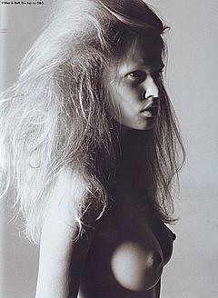Blonde Lara Stone topless black-&-white photo