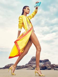 Daniela Braga sexy legs in in Harper's Bazaar Brazil 2016 January