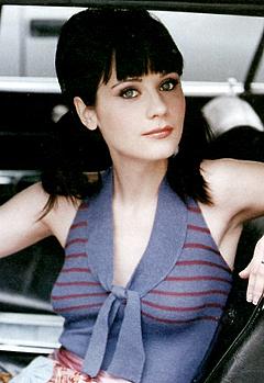 Zooey Deschanel sitting in a car