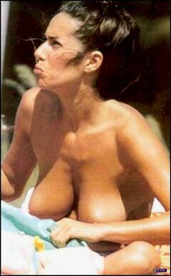 Elenoire Casalegno shows her nude tits on a beach paparazzi photo