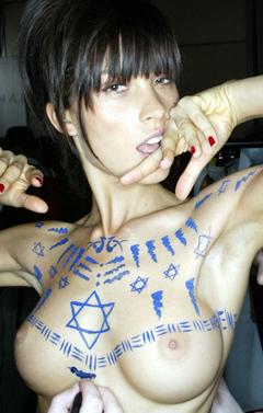 Petra Nemcova topless at London Fashion Week backstage