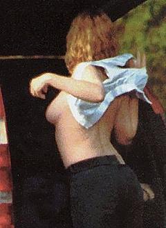Drew Barrymore changing shows her tits