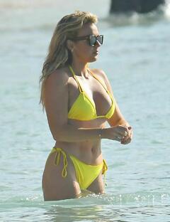 Tallia Storm sexy in yellow bikini at Sandy Lane Hotel’s beach in Barbados