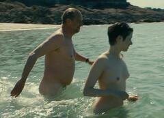 Daphne Patakia nude in a ocean at Sur la branche
