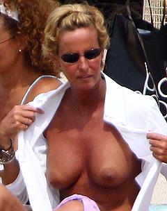 Federica Mancini topless on a beach