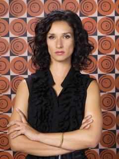 Indira Varma in black dresss