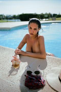 Guadi Galano topless in a pool