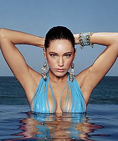 Kelly Brook in wet bikini top