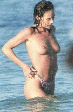 Elena Sofia Ricci topless in a water paparazzi photo