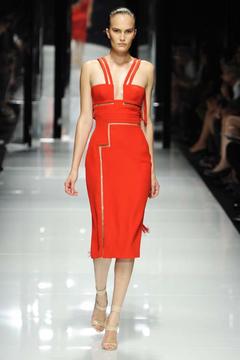 Alla Kostromicheva walks runway in red dress at Versace fashion show