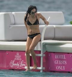 Andrea Corr enjoys a day on the beach at the at Sandy Lane Hotel in Barbados