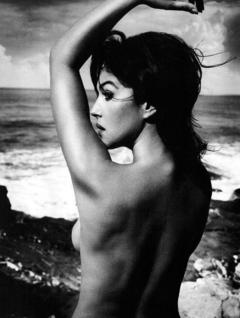 Monica Bellucci braless black-&-white photo