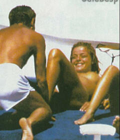 Inma del Moral sunbathing topless on a yacht paparazzi photo