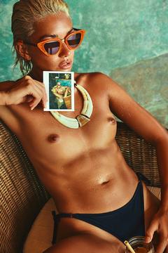 Mel Palummo topless poolside