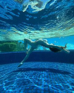 Sydney Sweeney in bikini in the pool for Amber Asaly photoshoot - March 2025