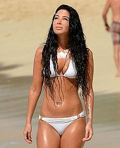 Singer Tulisa Contostavlos in white bikini