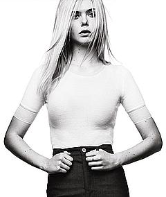 Blonde Elle Fanning in tight top