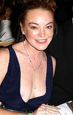 Lindsay Lohan areola slip at birthday party in Porto-Cervo