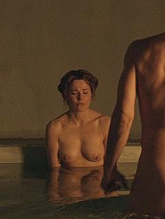 Lucy Lawless nude in a water scene from Spartacus Gods of the Arena