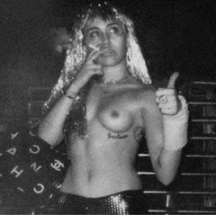 Miley Cyrus smoking topless