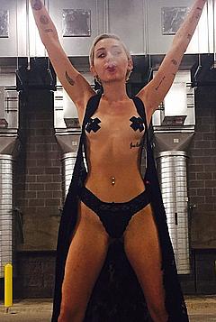 Miley Cyrus topless with pasties