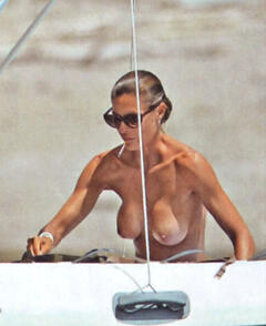 Martina Colombari topless on a boat paparazzi photo