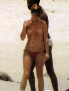 French actress Nathalie Baye topless on a beach paparazzi photo