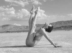 Nina Burri nude  doing yoga in a desert