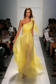 Tiiu Kuik in yellow dress runway image