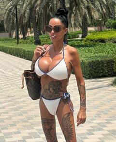 Katie Price in white bikini during her holiday trip out in Dubai - July 2025