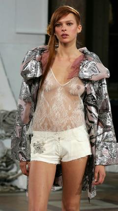 Elise Crombez braless in see through top