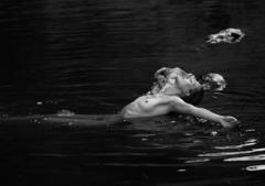 Lauren Bonner topless in a water