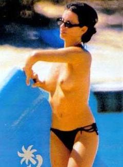 Brunette actress Penelope Cruz topless on a beach
