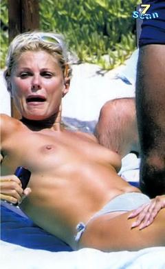 Patrizia Pellegrino topless on a beach