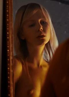 Adelaide Clemens topless in a mirror scene from Generation Um