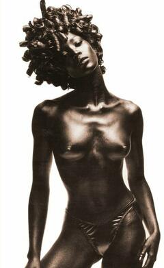 Naomi Campbell posing topless photo