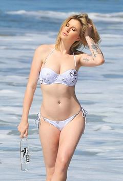 Ireland Baldwin in bikini on set of 138 Water Photoshoot in Malibu