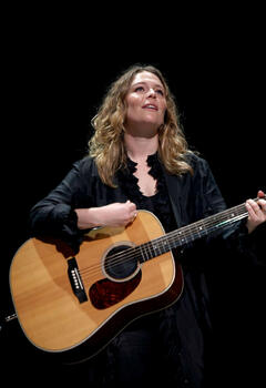 Maggie Rogers performs onstage during a concert to benefit The Contemplative Sciences Center in Charlottesville, Virginia - April 2025