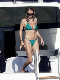 Leni Klum wearing a green bikini in France