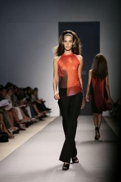 Emina Cunmulaj runway braless in see through top